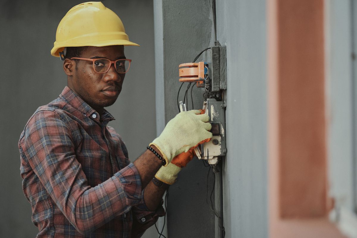 Electrician on a local service call, the kind of home service business local search marketing sends new jobs to